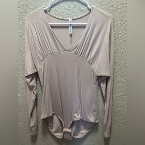 a tight mid V neck bodysuit!